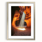 Silver-framed landscape artwork featuring a cave scene, elegantly matted for a refined presentation. Ideal for home decor enthusiasts seeking a touch of natural beauty.
