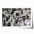 Abstract geometric rolled print showcasing vibrant blue, orange, and yellow shapes, elegantly packaged in a protective cardboard tube for safe delivery.