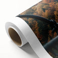 Rolled canvas artwork showcasing a vibrant landscape bridge design with intricate details and rich colors, ideal for enhancing home decor and artistic spaces.