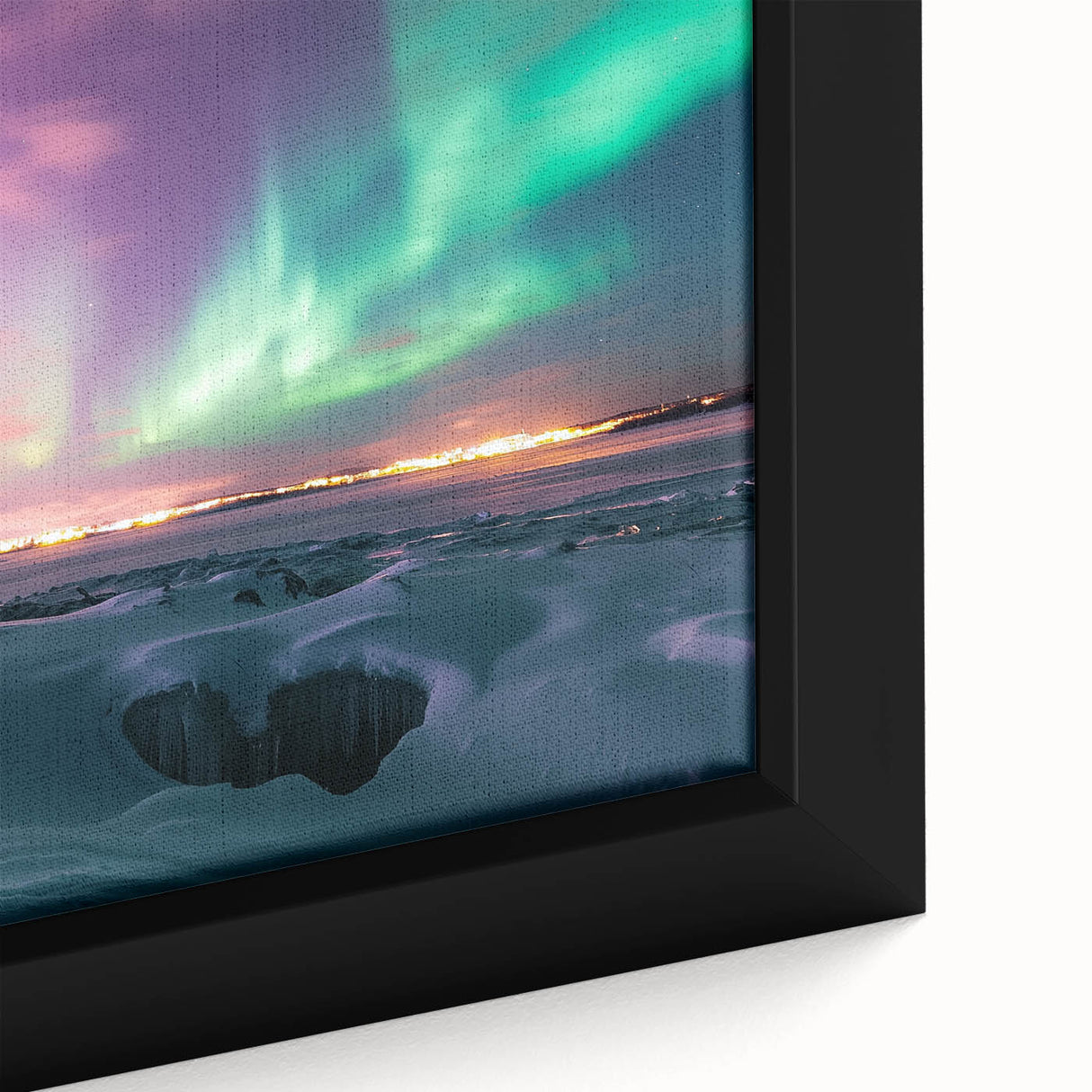 Close-up of a framed canvas artwork depicting a serene countryside landscape, showcasing vibrant greens and earthy tones, perfect for home decor.