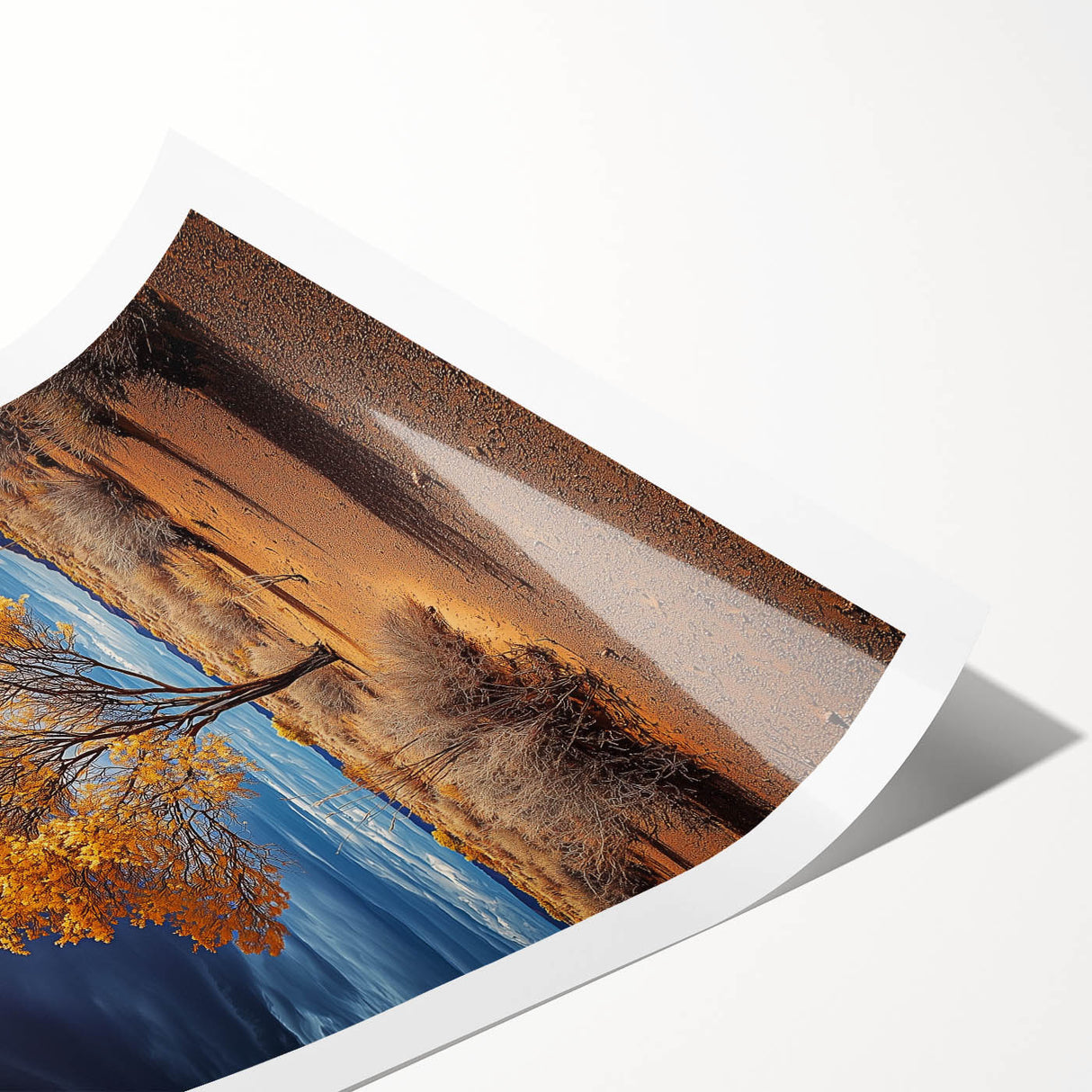 Vibrant rolled print of a serene landscape featuring lush green fields under a bright blue sky, elegantly packaged in a protective cardboard tube for easy storage.