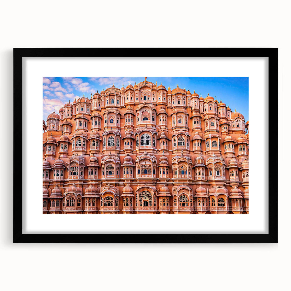 Extra large abstract art print depicting colorful, textured scenery of India, framed in black, ideal for living room decor.