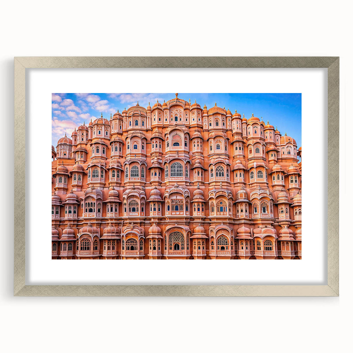Textured abstract art print depicting a serene Indian landscape in muted earth tones, framed in silver.