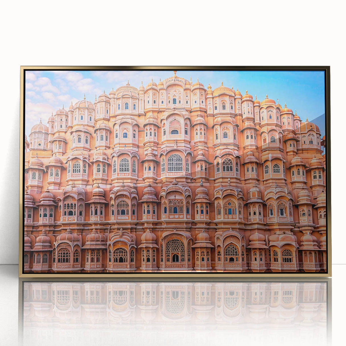 Large art print of an Indian landscape in gold and green tones on framed acrylic, in a mid-century modernist style.