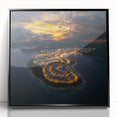 Framed acrylic artwork showcasing a dramatic landscape of cliffs against a vibrant sky, presented in a sleek black frame, perfect for modern home decor.