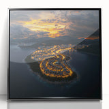 Framed acrylic artwork showcasing a dramatic landscape of cliffs against a vibrant sky, presented in a sleek black frame, perfect for modern home decor.