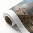 Rolled canvas artwork showcasing a vibrant landscape design, featuring rich colors and intricate details, tightly secured in a protective cardboard tube for safe shipping.