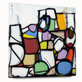 Abstract geometric acrylic glass artwork showcasing a vibrant design with distinct shapes and colors, viewed from the side with visible pins, perfect for modern decor.
