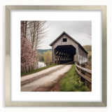 Textured art of a covered bridge in muted gray tones, framed in silver, ideal for bedroom decor.