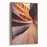 Framed landscape canvas showcasing a stunning canyon view with vibrant colors, silver frame, perfect for enhancing modern home decor in living rooms or offices.