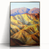 Framed acrylic artwork depicting a vibrant desert landscape, showcasing warm hues of orange and yellow with detailed textures, perfect for home decor.