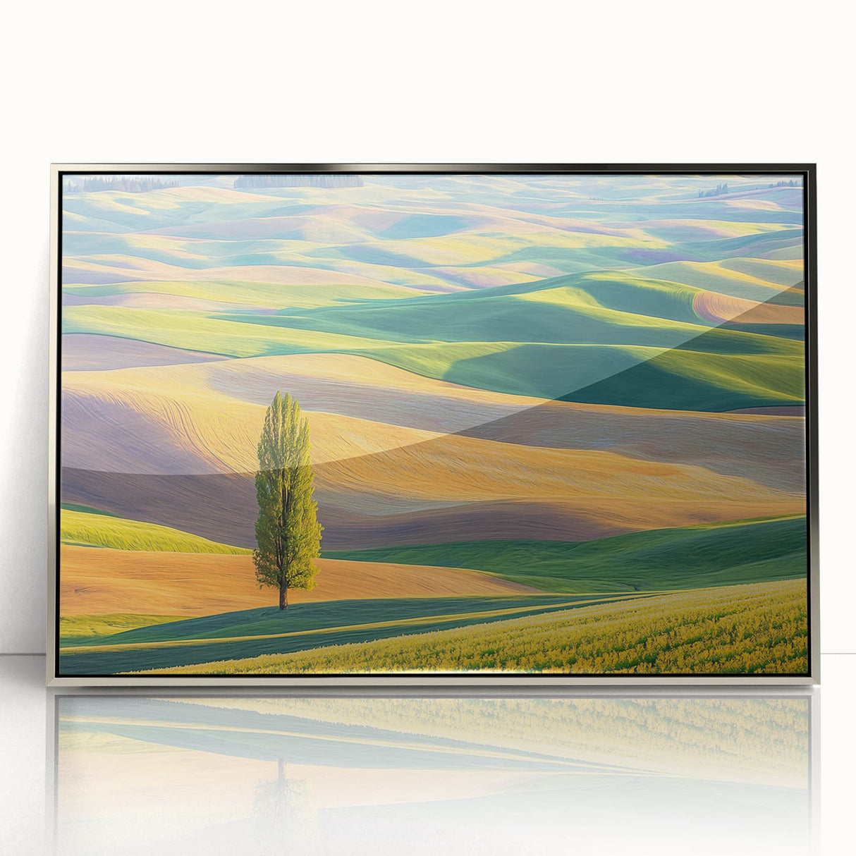 Framed acrylic artwork depicting a serene landscape of rolling fields under a clear blue sky, featuring vibrant green hues and a modern silver frame, perfect for home decor.