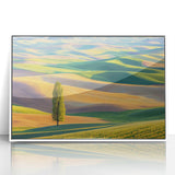Framed acrylic artwork showcasing a serene landscape of lush green fields under a bright blue sky, ideal for home decor and nature enthusiasts.