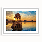 Abstract art print of a serene Indian landscape in soft earth tones on a framed white mat, suitable for dining room decor.