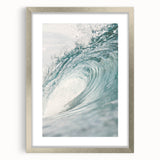 Textured abstract art print in warm orange and red tones, framed in silver, ideal for bedroom art.