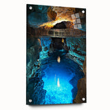 Side view of an acrylic glass artwork depicting a scenic landscape with caves, highlighted by vibrant colors and secured with pins for display. This design adds a modern touch to any interior decor.