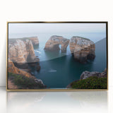 Framed acrylic artwork showcasing a vibrant landscape of cliffs against a dramatic sky, highlighted by gold accents, perfect for modern home decor.