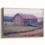 Framed landscape canvas showcasing a rustic barn scene with gold accents, displayed at a side angle, perfect for farmhouse decor enthusiasts. Ideal for enhancing interior aesthetics.