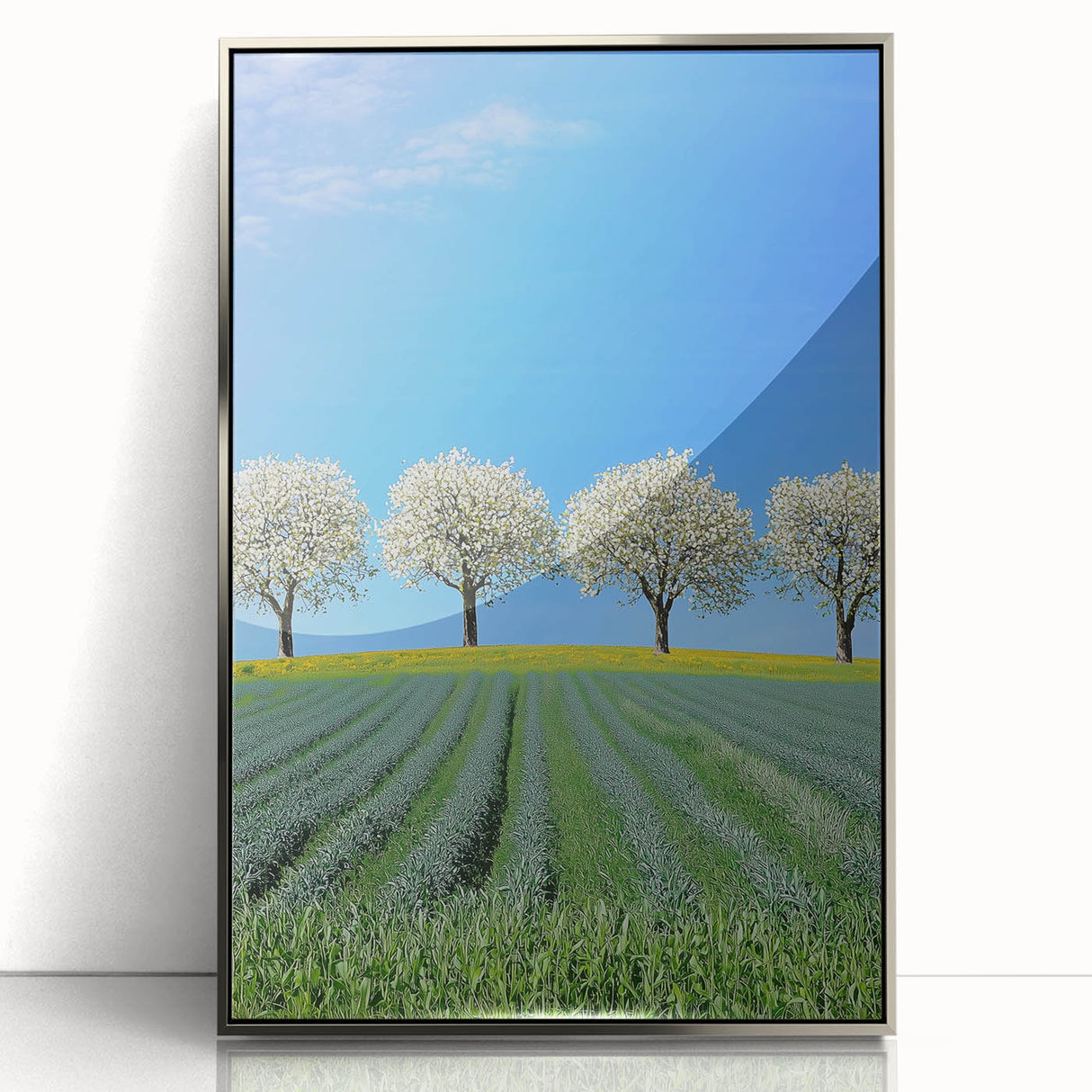 Framed acrylic artwork showcasing a serene landscape of rolling fields in vibrant greens and earthy tones, elegantly designed for modern home decor.