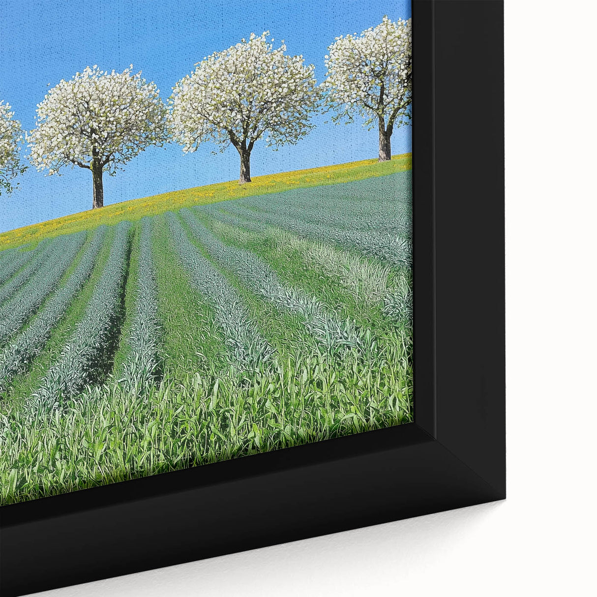 Close-up of a framed canvas depicting vibrant green rolling fields and a serene landscape, showcasing intricate details and textures, ideal for home decor.