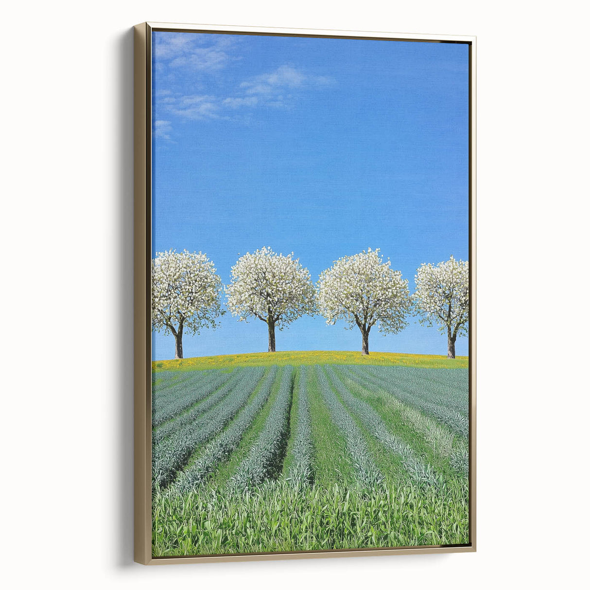 Framed canvas art depicting a serene landscape with golden hues and vibrant fields, showcasing a side view that highlights its elegant design and texture. Perfect for enhancing interior decor.