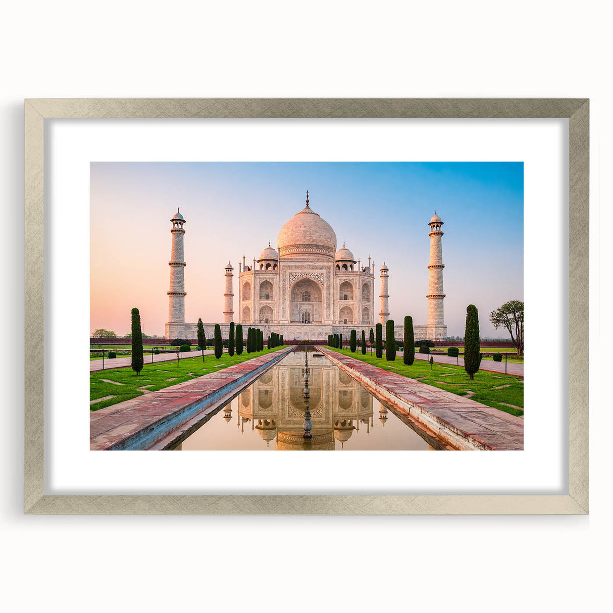 Textured abstract art print depicting a serene Indian landscape in muted earth tones, framed in silver.