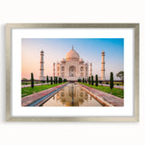 Textured abstract art print depicting a serene Indian landscape in muted earth tones, framed in silver.
