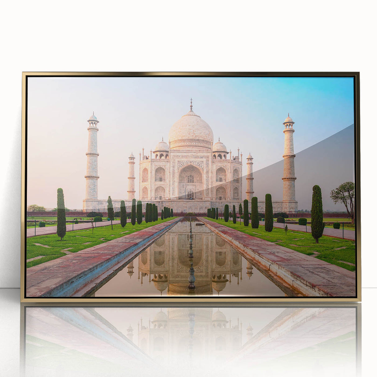 Large art print of an Indian scenery in mid-century modernist style, featuring vibrant gold and blue tones on framed acrylic.