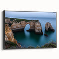 Framed canvas artwork showcasing a breathtaking cliff landscape with rich colors and dramatic textures, presented in a sleek black frame, ideal for home decor.
