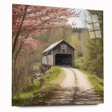 Large abstract wall art on acrylic glass depicting a covered bridge in muted earth tones.
