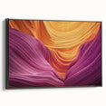 Framed landscape canvas artwork showcasing vibrant canyons in rich earthy tones, viewed from the side with a sleek black frame, ideal for modern home decor.