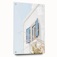 Large abstract wall art in vibrant orange and blue hues on acrylic glass, suitable for bedroom or dining room decor.