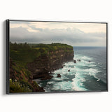 Framed canvas art depicting dramatic cliffs in a landscape scene, showcasing deep colors and intricate details, presented in a sleek black frame, ideal for home decor.