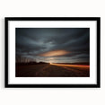 Black frame showcasing a countryside landscape print with a white mat, ideal for home decor. The framed artwork emphasizes serene rural scenery, perfect for enhancing interior aesthetics.