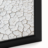 Close-up of a desert landscape framed canvas print showcasing vibrant orange and yellow hues, capturing the serene beauty of arid terrain with intricate details. Ideal for home decor enthusiasts seeking unique art pieces that evoke a sense of tranquility and warmth.
