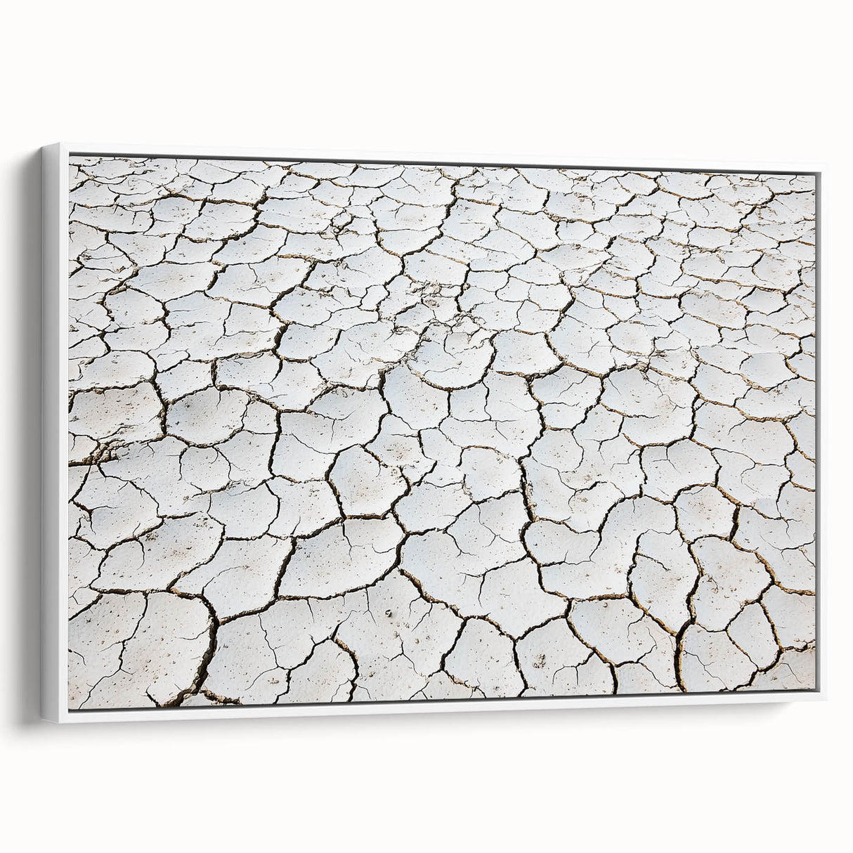 Framed canvas artwork depicting a serene desert landscape with soft, warm colors and intricate details, ideal for enhancing home decor in modern or rustic settings.