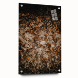 Large abstract wall art depicting fall scenery in warm orange and red tones on acrylic glass, suitable for dining room decor.