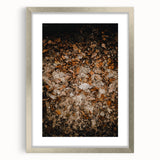Abstract art print featuring textured swirls in autumnal colors on a large canvas, framed in silver.