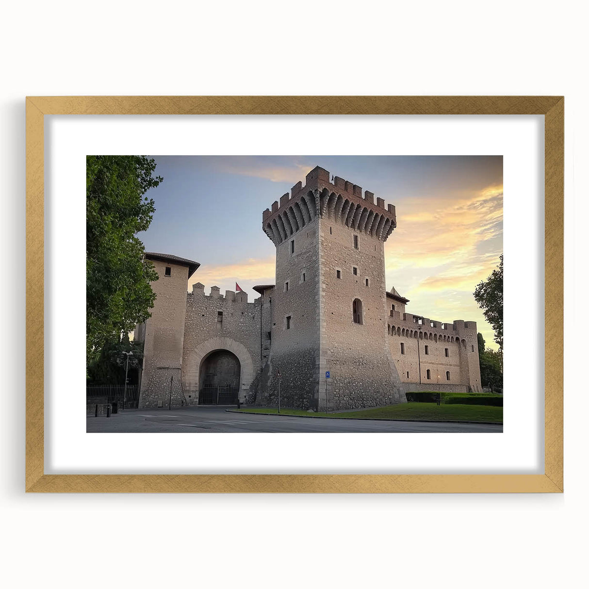 Elegant gold-framed landscape artwork featuring a picturesque castle, complete with a mat for added depth, ideal for home decor and enhancing interior aesthetics.