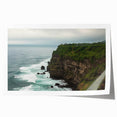 Stunning rolled print showcasing a dramatic landscape of rugged cliffs under a vibrant sunset, perfect for home decor or art enthusiasts.