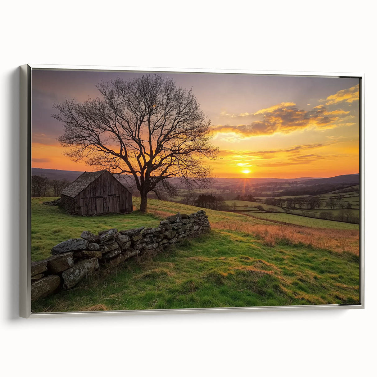 Silver-framed landscape canvas art showcasing a serene barn scene, with vibrant colors and detailed textures, perfect for home decor or office enhancement.