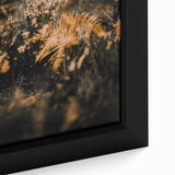 Close-up of a black wall art canvas featuring a textured, colorful abstract design, ideal for living room decor.