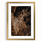 Extra large abstract art print featuring textured swirls in autumn hues on a gold-framed canvas, ideal for living room decor.