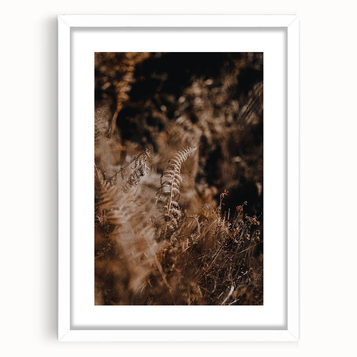 Abstract art print featuring swirling autumn colors on a white framed canvas, ideal for dining room ambiance.