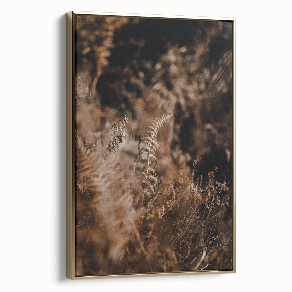 Framed canvas wall art depicting a vintage-style landscape with autumn trees and a golden palette.