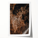 Extra large rolled print of autumnal floral art in warm orange and red tones.