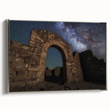 Framed canvas artwork showcasing a picturesque landscape with a majestic castle, featuring a silver frame and a side view that highlights its elegant design. This piece adds a sophisticated touch to home decor.
