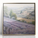 Framed landscape wall art depicting a serene countryside scene with vibrant green fields and a golden acrylic frame, ideal for home decor enhancement.