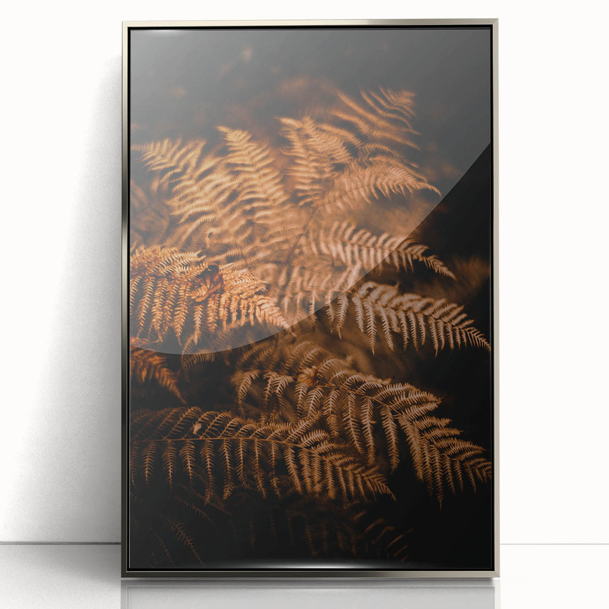 Mid-century modernist art featuring abstract autumnal shapes in warm tones on a framed acrylic print.
