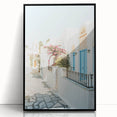Large abstract wall art on acrylic, featuring bold blue and orange swirls, framed in black.